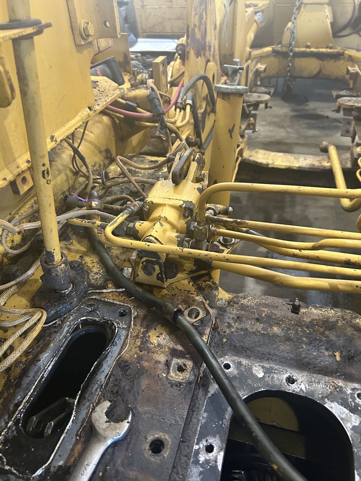 Hydraulic lines and fittings on heavy equipment during a repair
